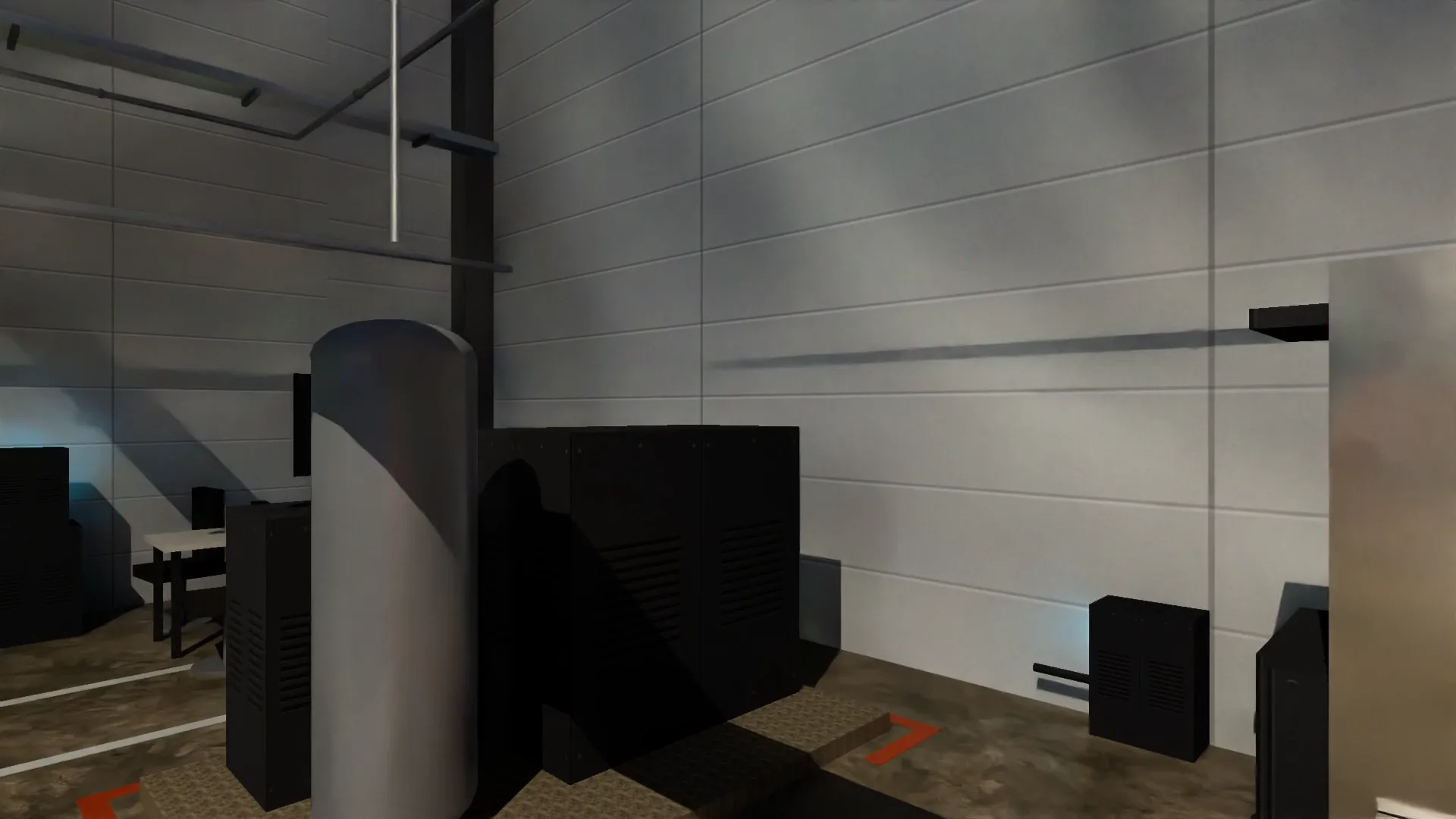 Just inside: switch cabinets, a tank and the first workstation.