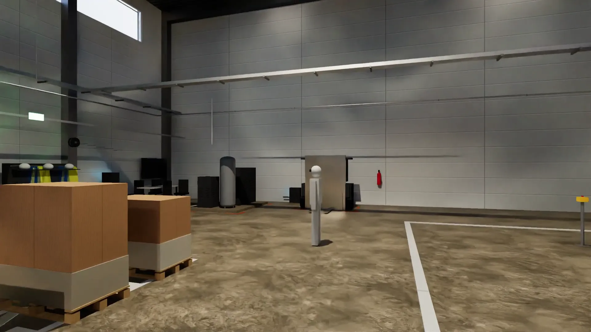The shop floor with floor markings, pallets and safety gear on the wall.
